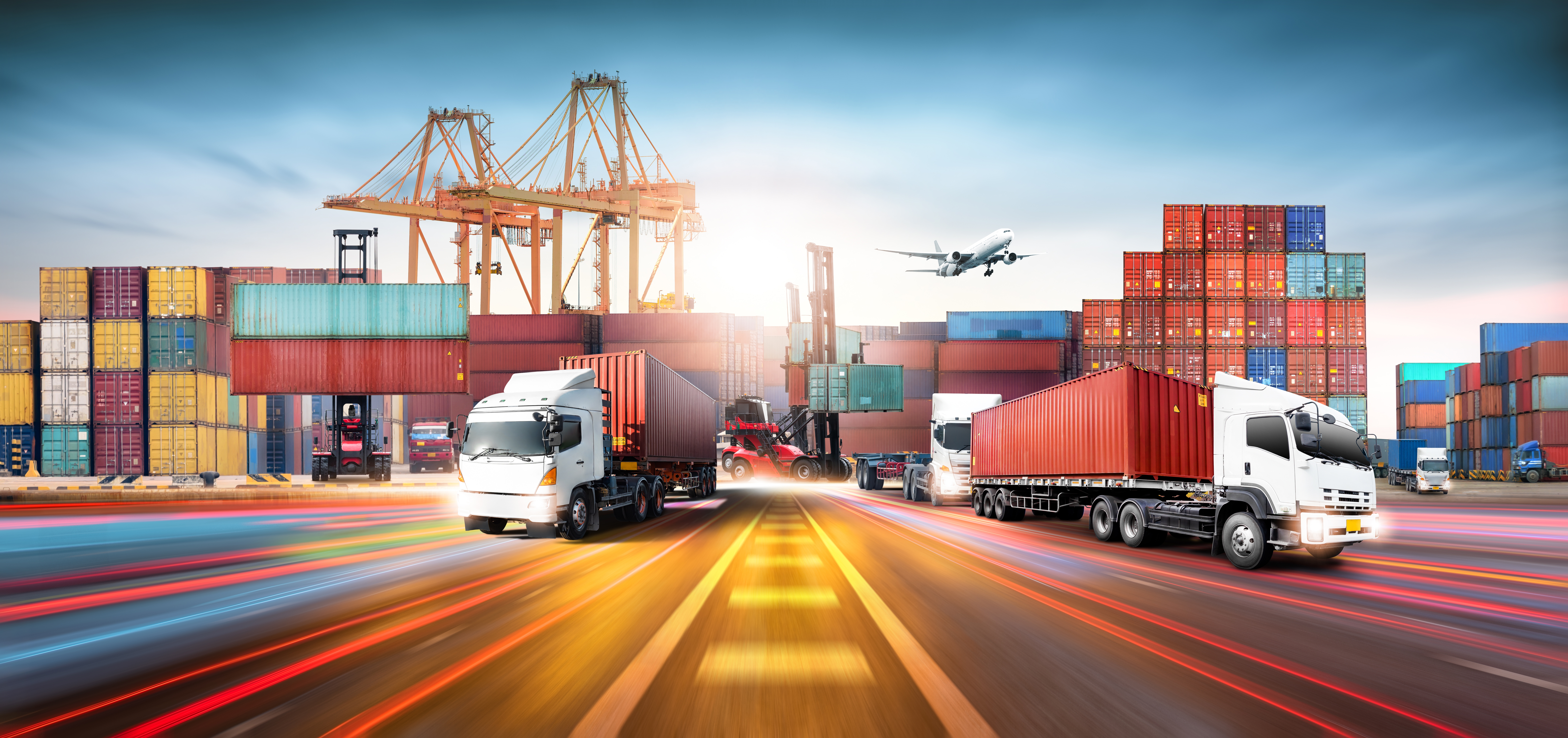 Global business logistics import export and container cargo freight ship during loading at industrial port by crane Global business logistics import export and container cargo freight ship during loading at industrial port by crane