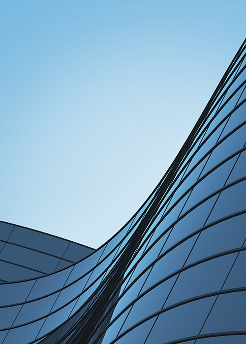 Curve-glass-building-and-dark-steel-window--Solvay-Shutterstock-500x700
