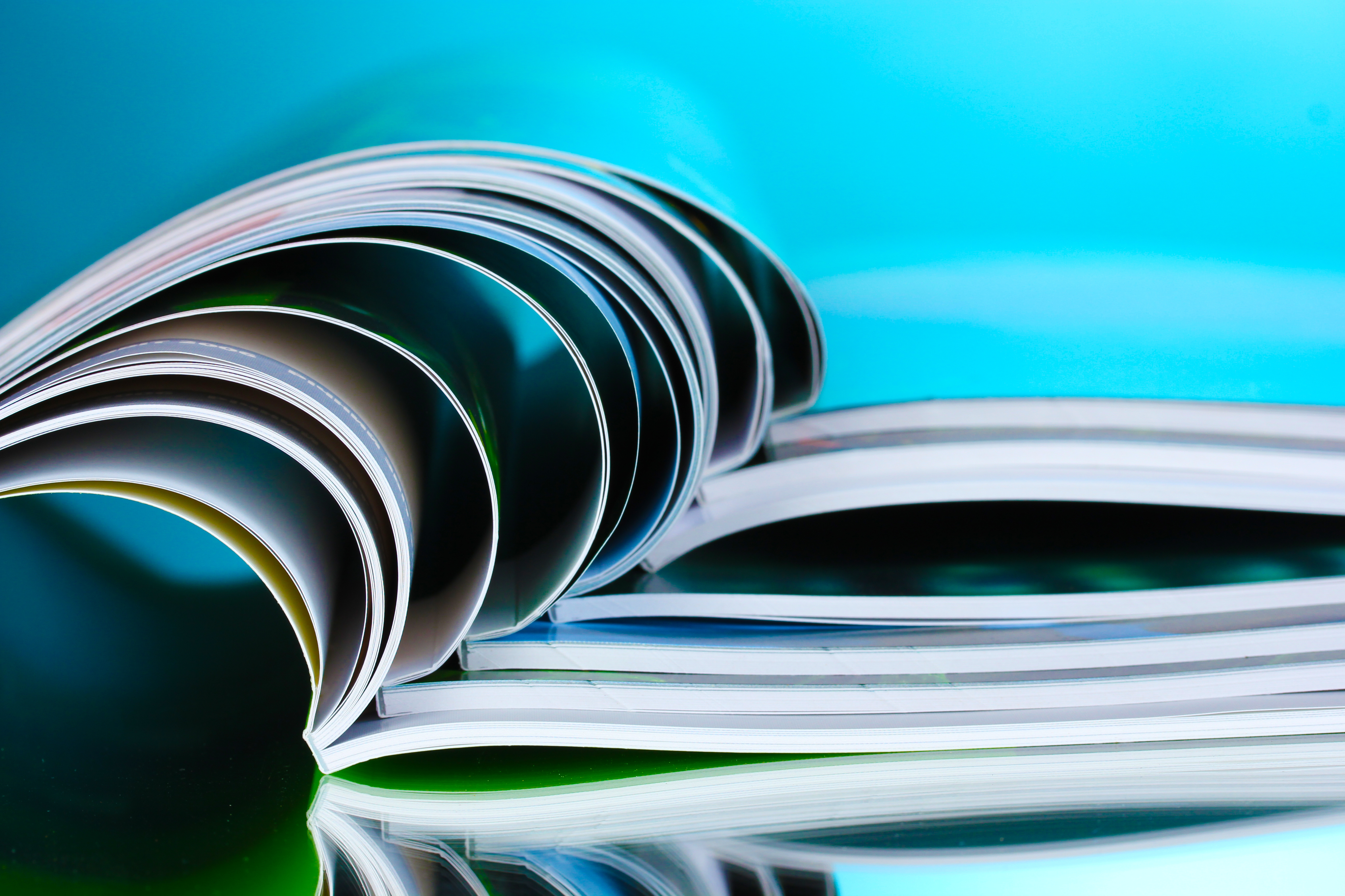 magazine on blue background magazine on blue background
