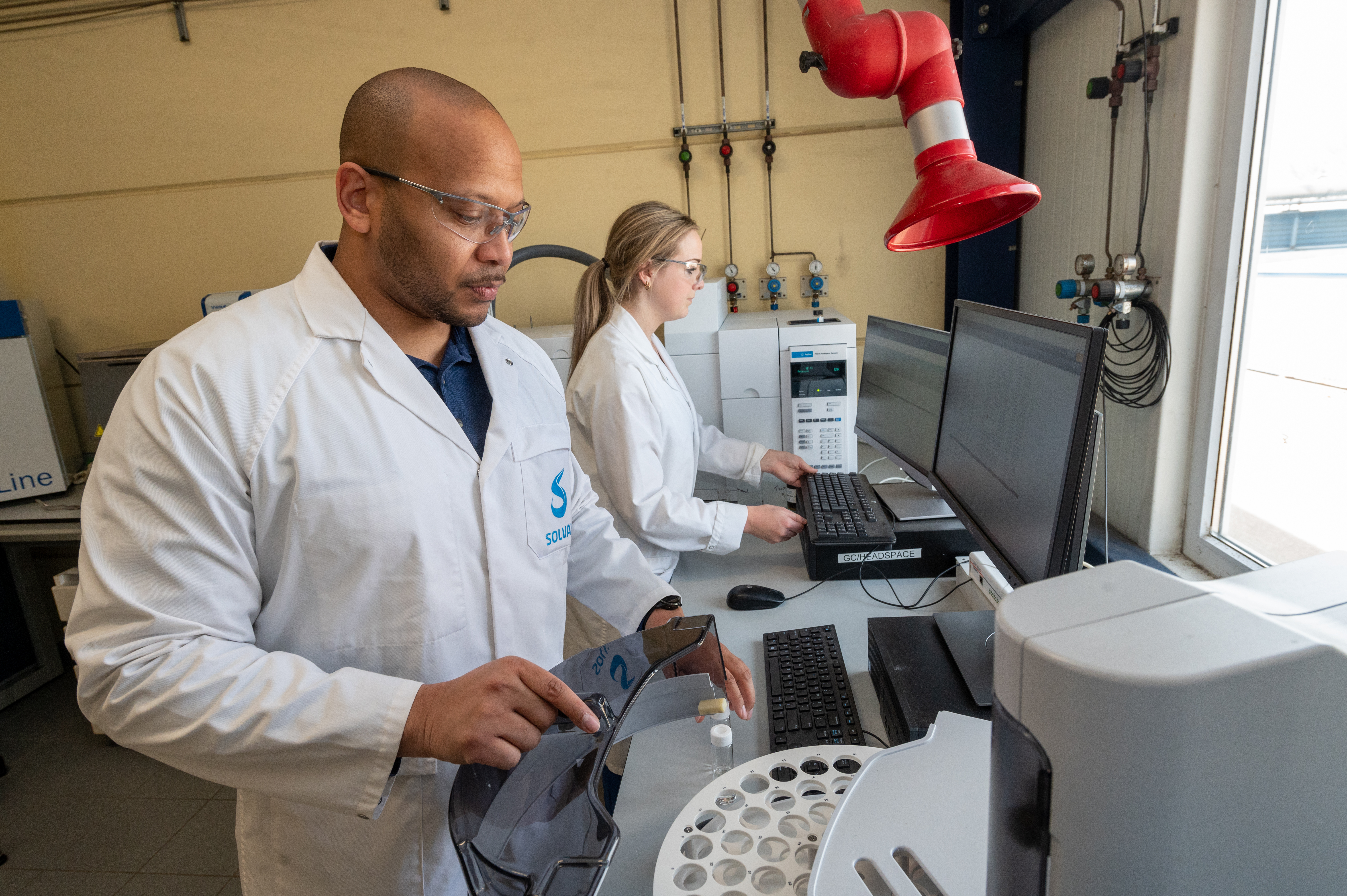Employees working in lab Employees working in lab