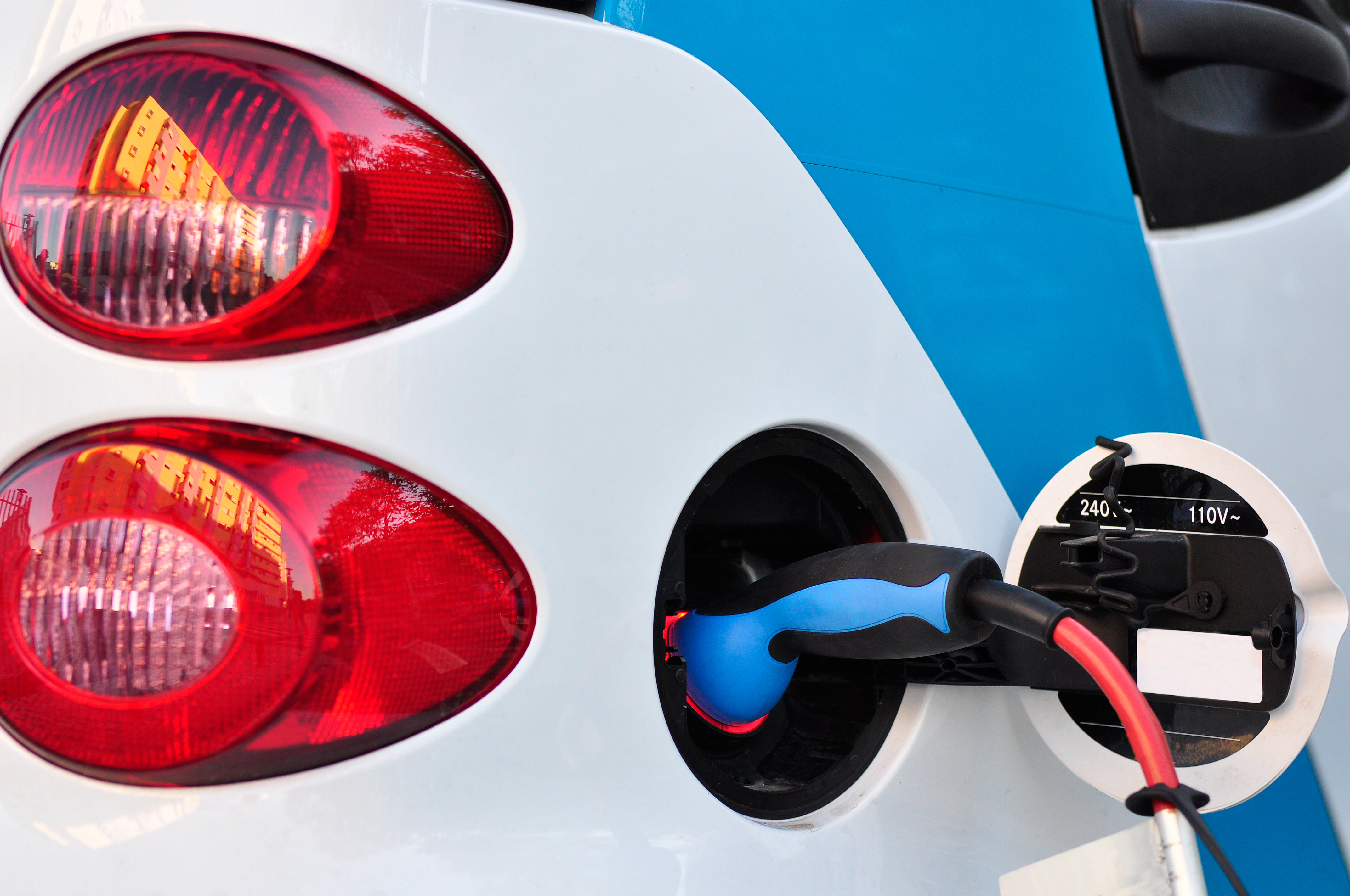 Electric car being recharged Electric car being recharged