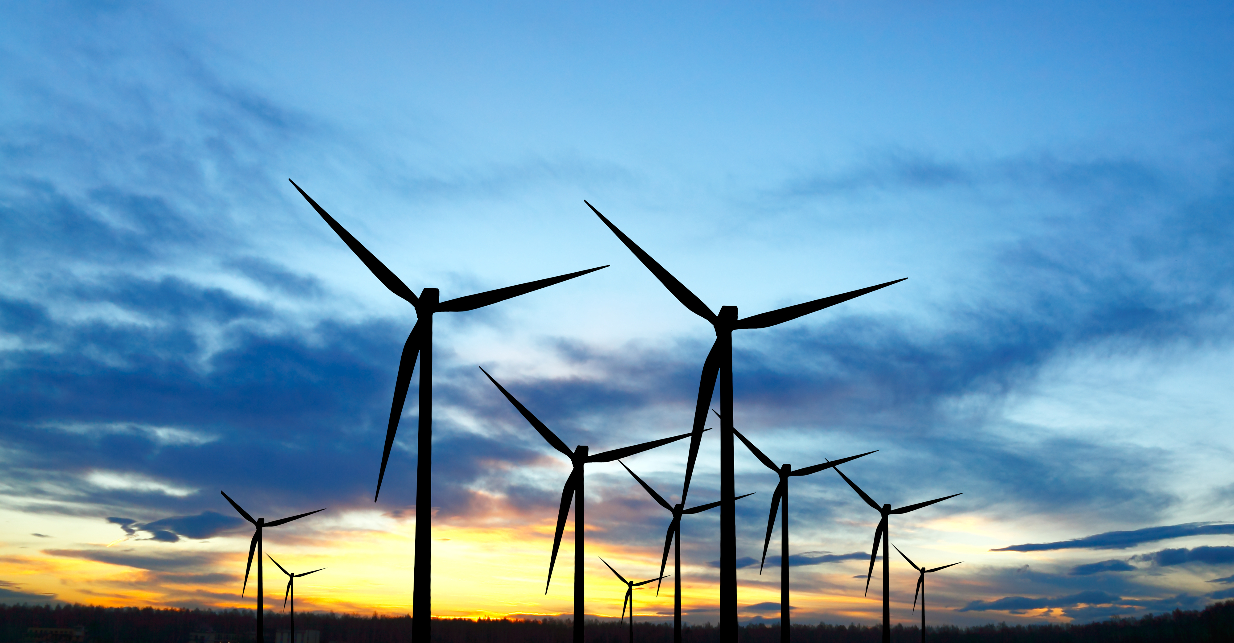 Wind turbine farm with rays of light Wind turbine farm with rays of light