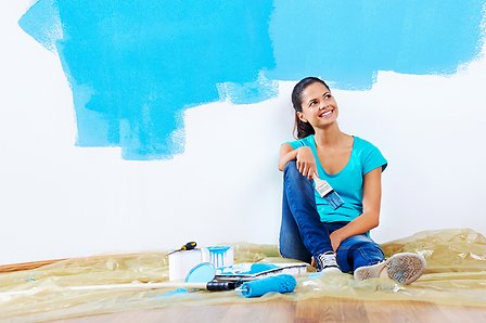 Young woman painting