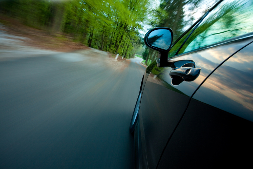 vehicle-with-door-handles-and-rearview-mirrors-driving-in-the-forest vehicle-with-door-handles-and-rearview-mirrors-driving-in-the-forest