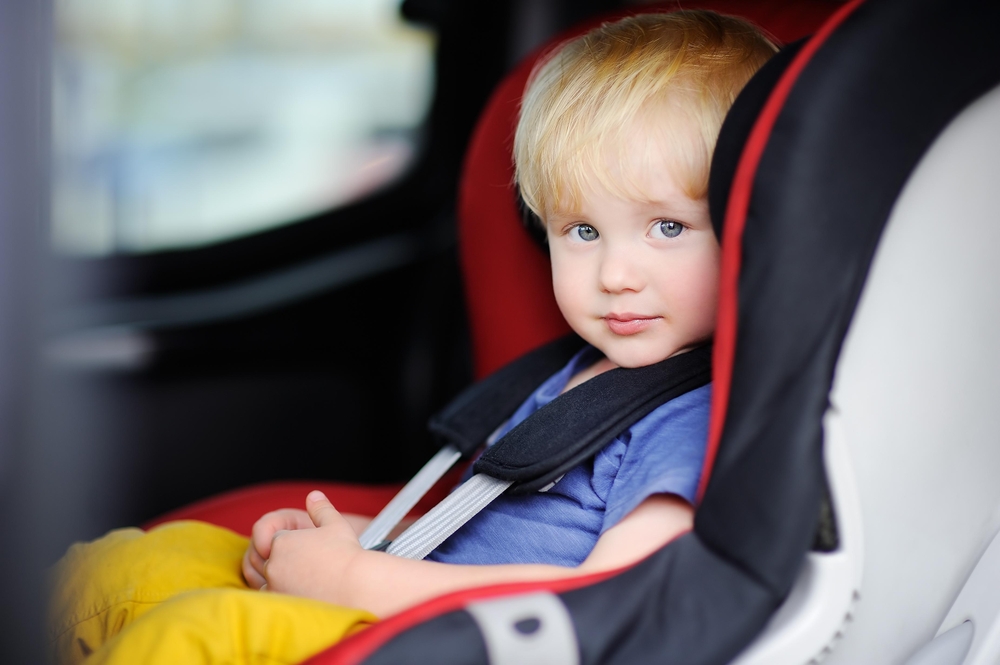toddler-sitting-in-a-child-car-seat toddler-sitting-in-a-child-car-seat
