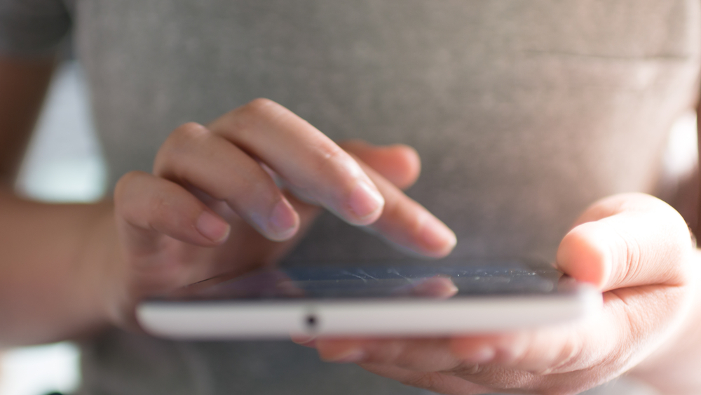 woman-hands-touching-and-using-digital-tablet woman-hands-touching-and-using-digital-tablet