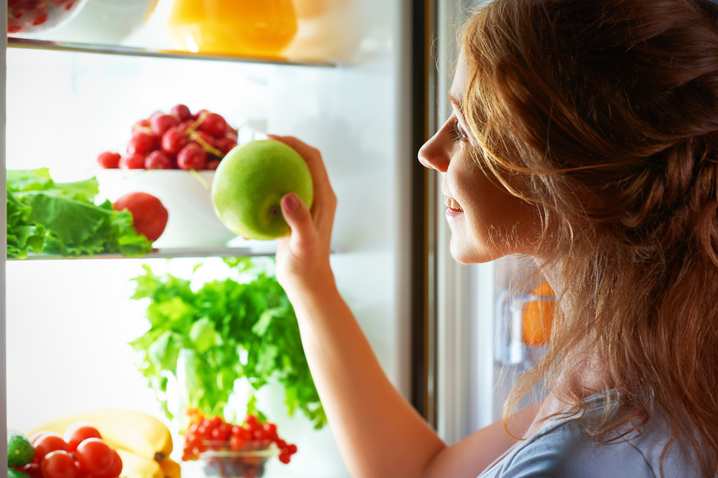 Fruit and vegetables into refrigerator