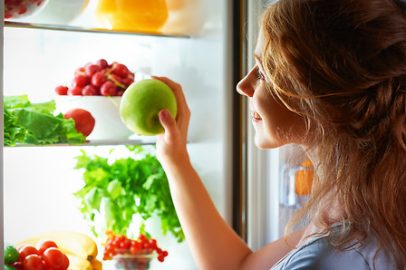 Fruit and vegetables into refrigerator