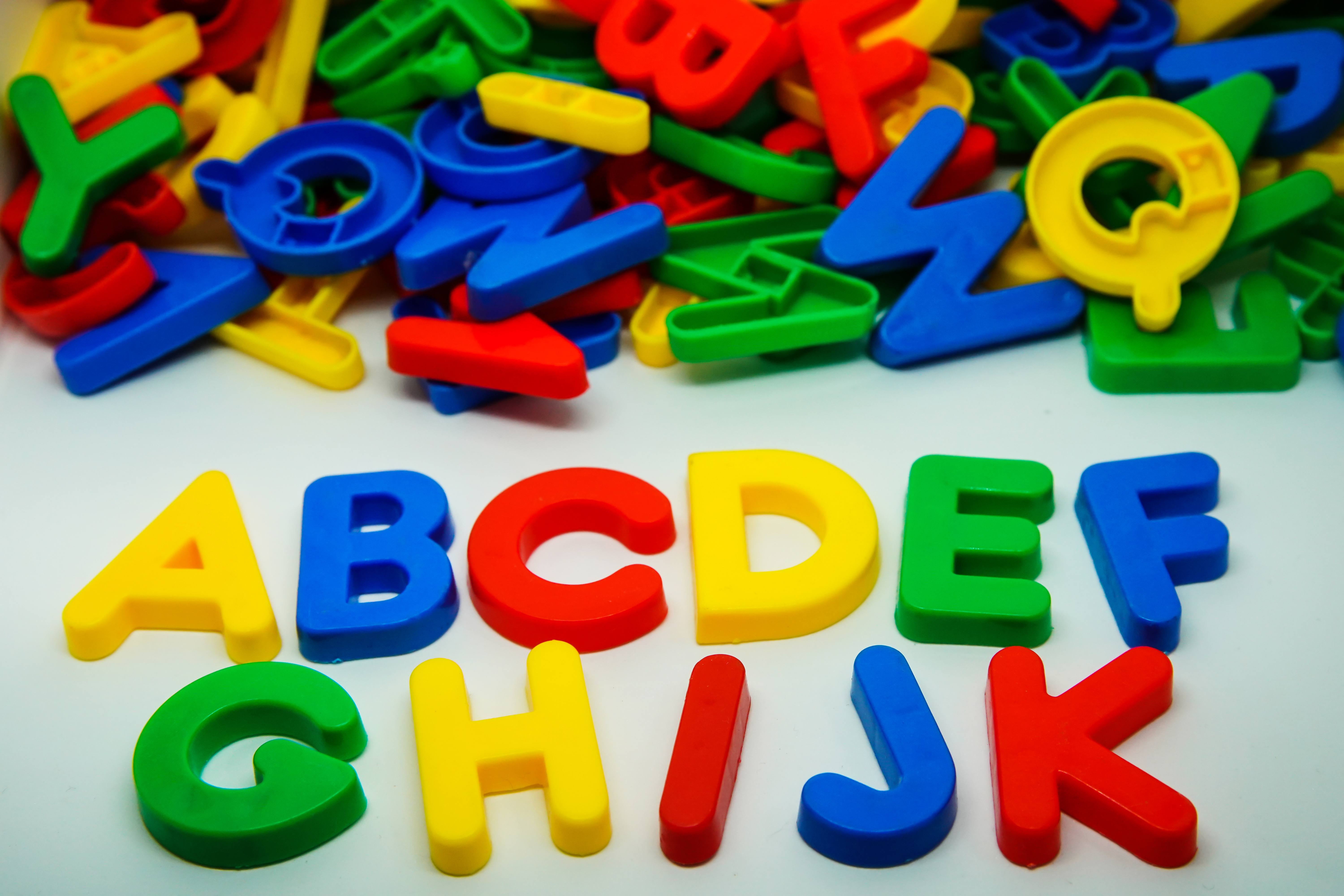 Colorul plastic letters spelling text Colorul plastic letters spelling text